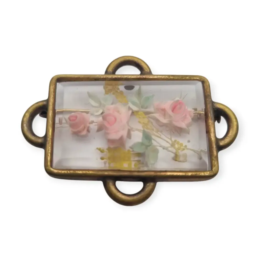 Broche Art Déco rectangular de época con flores en lucita de los ños 40.